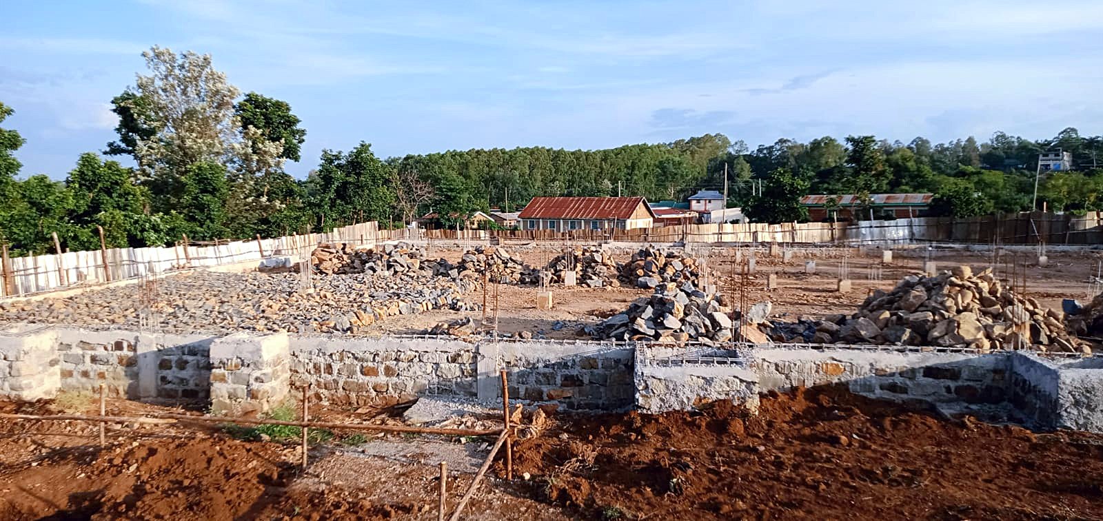 Stone masonry foundation walls and column starter bars