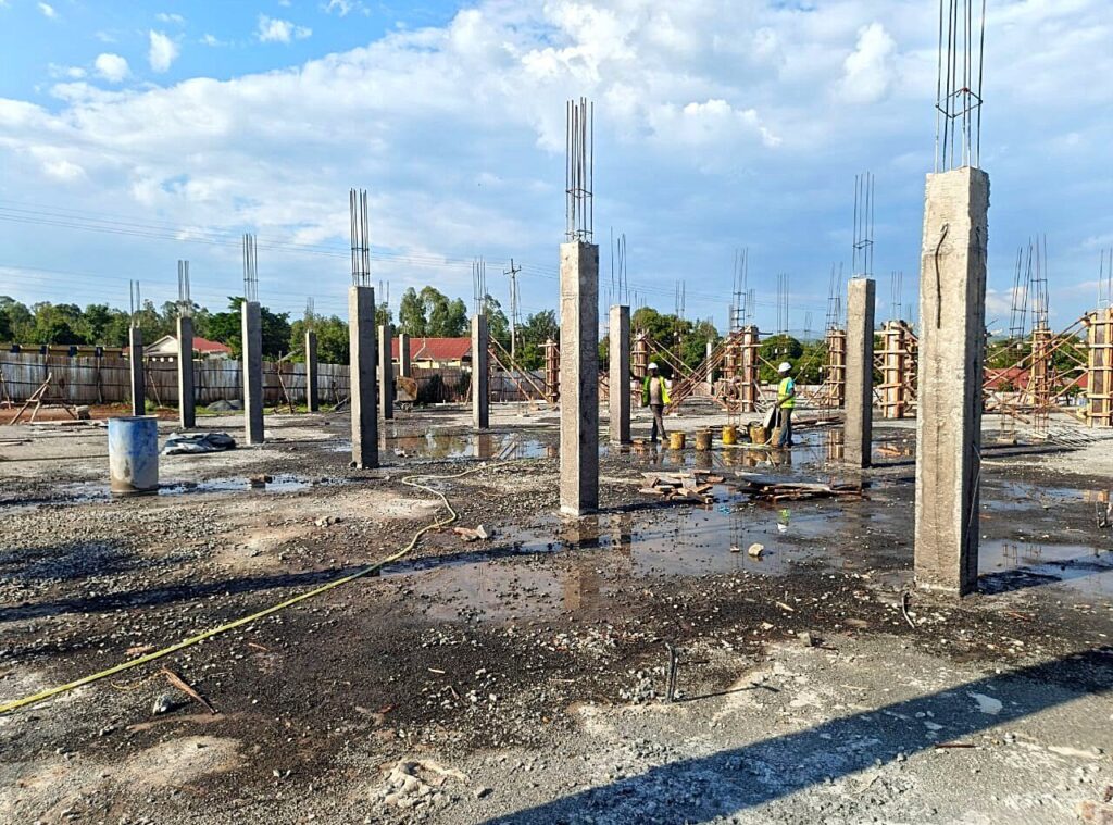 Ground-floor concrete columns rising from the slab